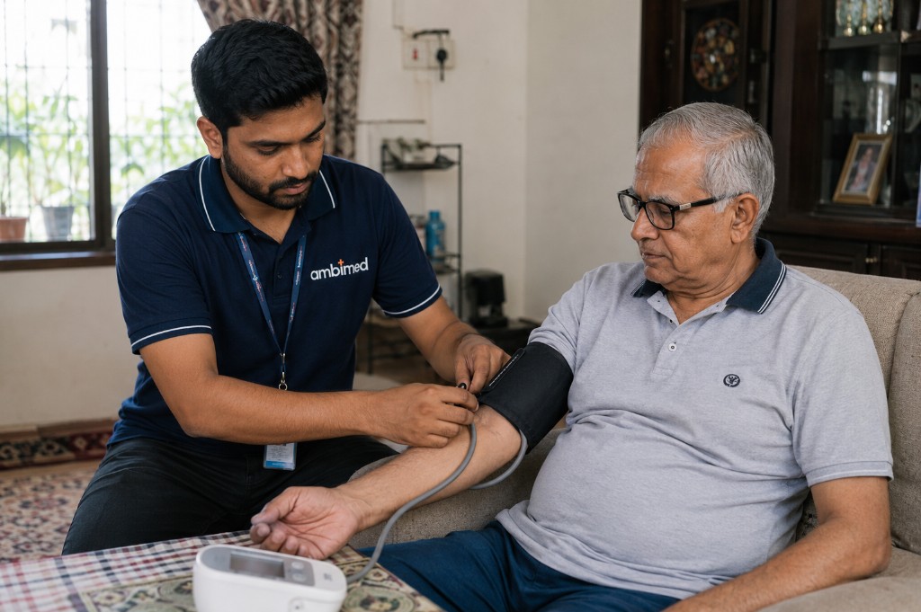 Ambimed caregiver monitoring blood pressure for an elderly patient at home